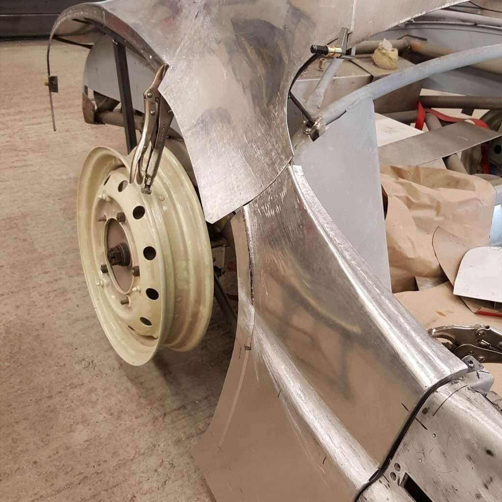 One side of the 1953 Jowett Jupiter restoration is well underway, and the mesmerising flowing fastback shape is starting to take shape and become a reality.