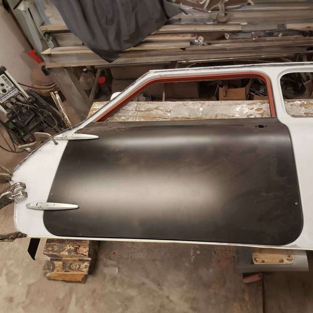 The 1969 Mini Cooper 998 MkII, owned by Paul Davenport of Plastics4Performance, is currently undergoing door fit assessment. Ensuring every detail aligns perfectly for a flawless finish and there’s some work to do here!